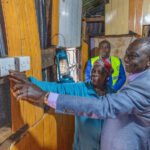 Ruto viewing a newly installed electricity meter box at a local netizens home in kirungu muranga county