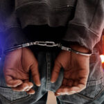 a picture of a man in handcuffs PHOTO| Istock