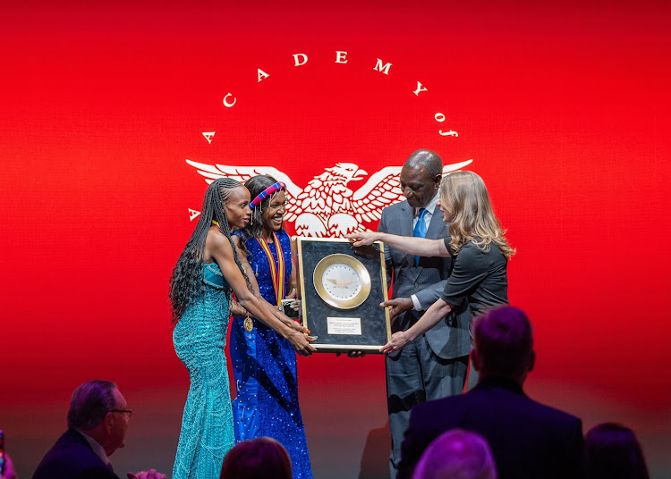 Beatrice Chebet and Faith Kipyegon Being Awarded by William Ruto and the lincon golden plate award ceremony in New York PHOTO| The-star