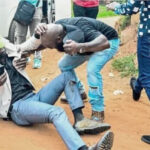 Uganda's Bobi wine on the ground after being shot PHOTO| The Star