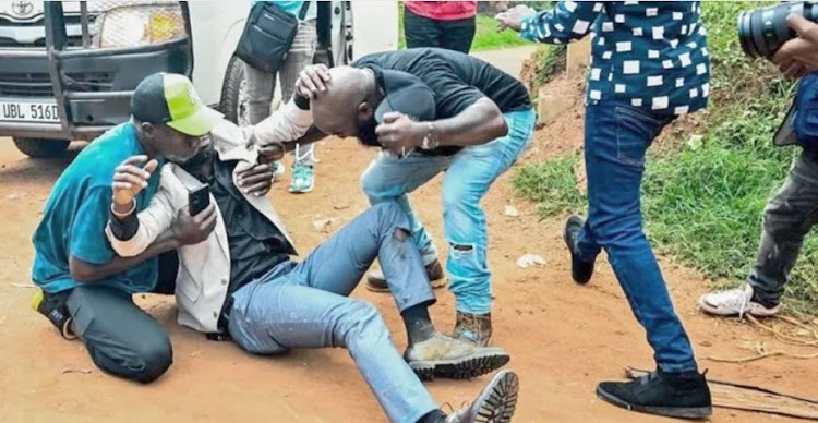 Uganda's Bobi wine on the ground after being shot PHOTO| The Star