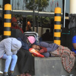 People sleeping at the JKIA International Airport, after being stranded for hours PHOTO| The Star kenya