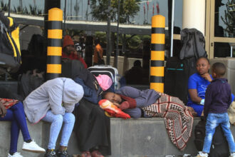 People sleeping at the JKIA International Airport, after being stranded for hours PHOTO| The Star kenya