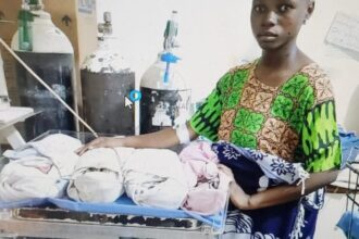 The 16-yr-old ugandan school girl with the quadruplets she just gave birth to PHOTO| East times