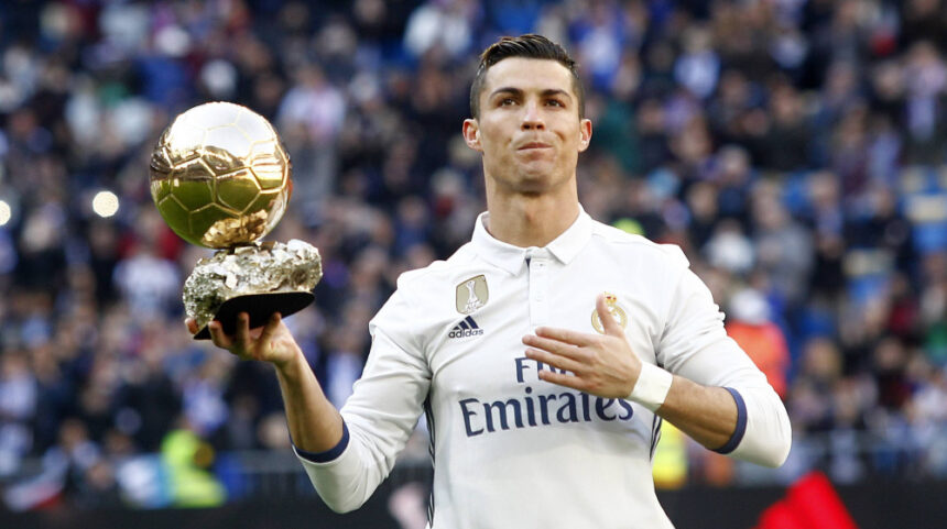 Cristiano Ronaldo with his Ballon-d-or PHOTO| Transfermarkt