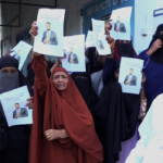 Family of Yusuf Hussein the abducted Wajir MCA holding Placards In Majengo Mombasa County PHOTO| The-star