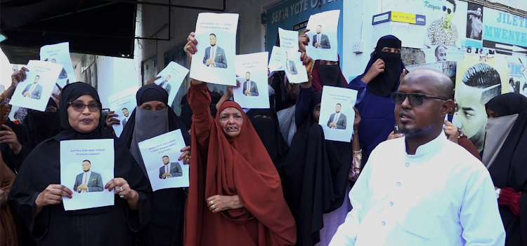 Family of Yusuf Hussein the abducted Wajir MCA holding Placards In Majengo Mombasa County PHOTO| The-star